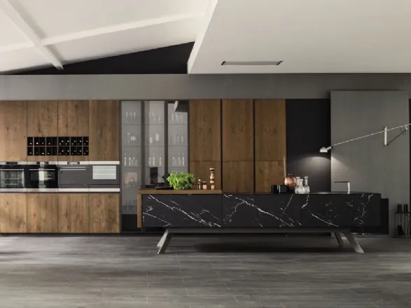 Cucina di design con isola centrale in legno rovere e marmo Loft di Arrex