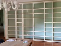 Libreria su misura in laccato opaco bianco di Lema