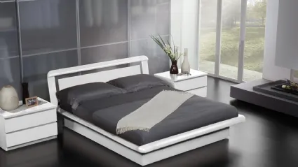 Letto matrimoniale in legno laccato Elica di Fratelli Elli