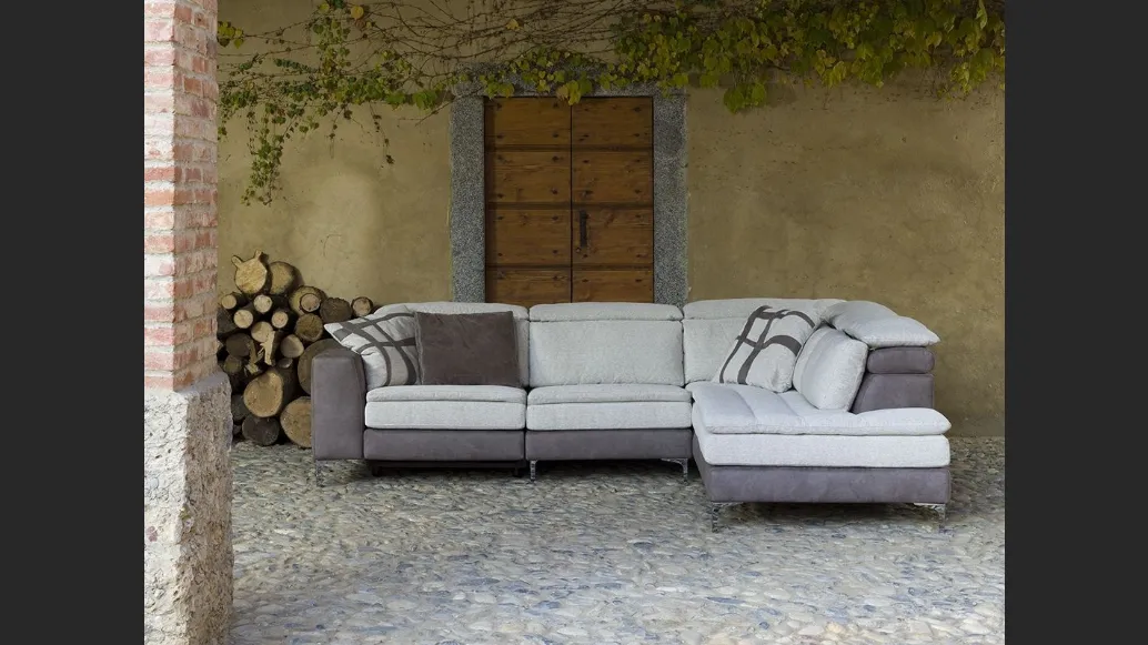 Divano con penisola in tessuto trapuntato Stella Sospeso di Flexstyle