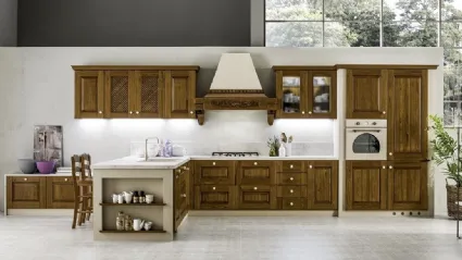 Cucina in Muratura angolare con penisola in legno tinto Noce Nora di Arrex